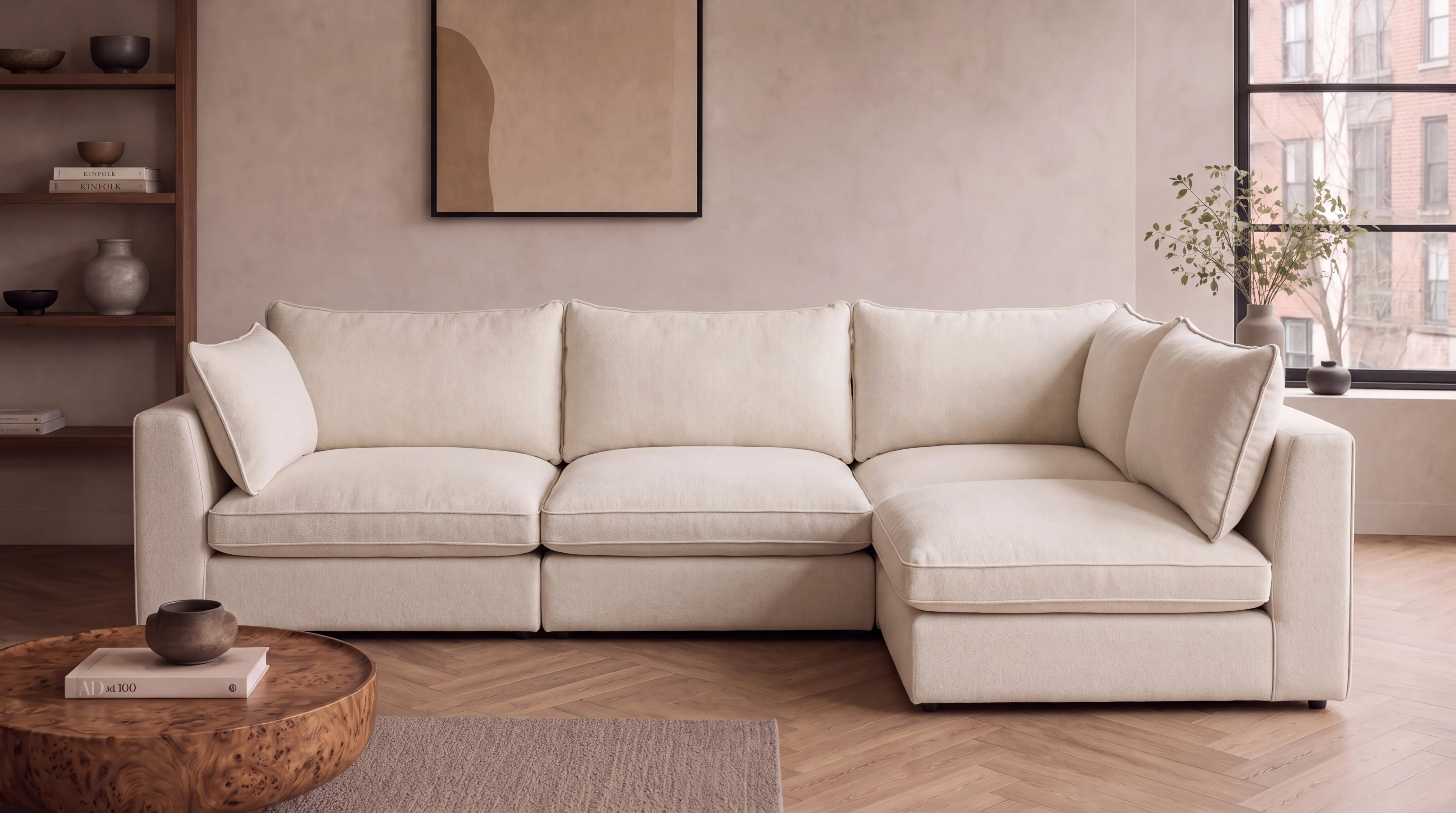 Cream modular corner sofa in a panelled room